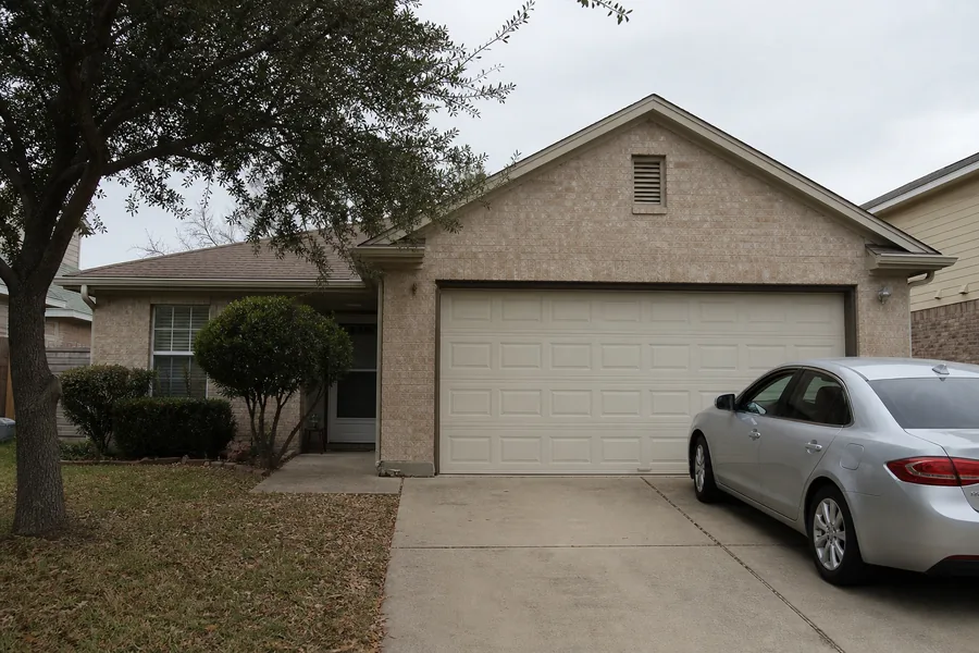 A house with an attached garage in Killeen, TX